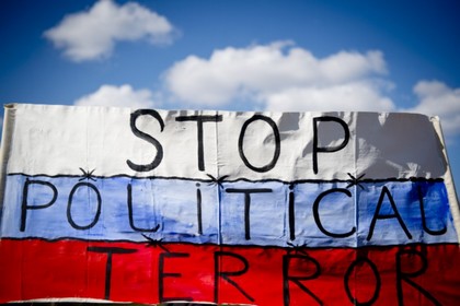 Путин не заметил обращенной к нему акции протеста в Ганновере