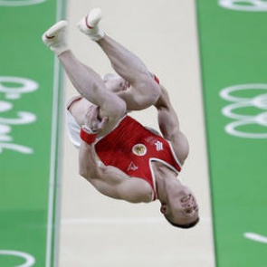 Российские гимнасты завоевали серебро в командном многоборье на Играх-2016