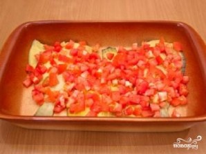 Камбала, запеченная с помидорами